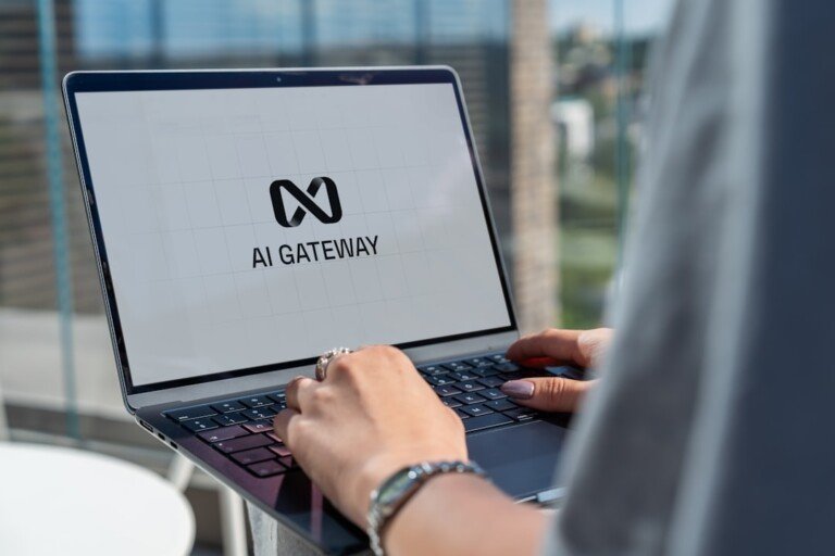 Blog 382 person using laptop with AI assistant dashboard productivity